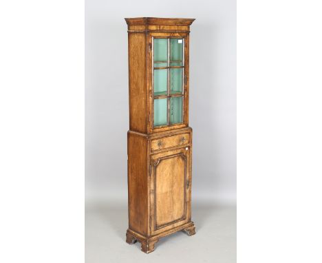 An early/mid-20th century George III style walnut narrow bookcase cabinet, height 167cm, width 51cm, depth 23cm.Buyer’s Premi