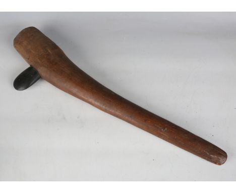 A Papua New Guinea wooden handled axe, inset with a polished black stone head, length 73cm. Note: obtained directly by the ve