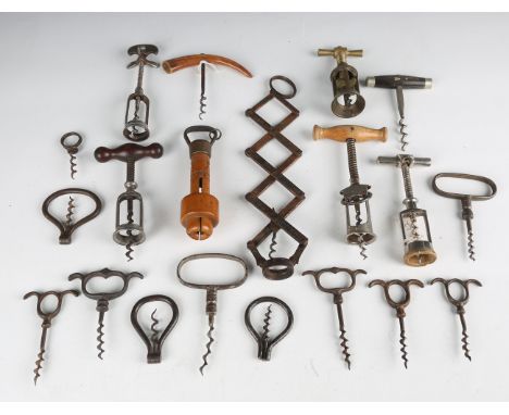 A collection of corkscrews and other collectors' items, including a concertina corkscrew, probably Wiers patent, various 'eye