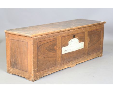 A late 19th century pine trunk, scumbled to imitate walnut, height 44cm, width 125cm, depth 38cm.Buyer’s Premium 29.4% (inclu