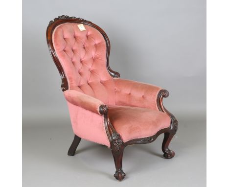 A late Victorian mahogany showframe armchair, upholstered in pink velour, height 109cm, width 75cm.Buyer’s Premium 29.4% (inc