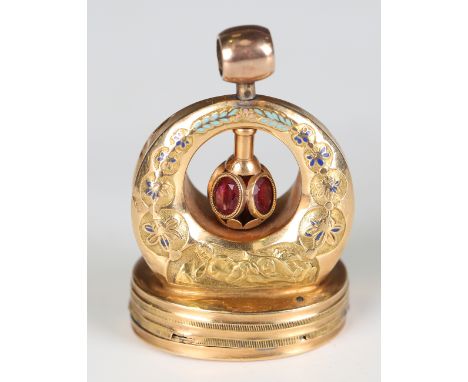 A mid-19th century Continental gold and enamel musical fob seal pendant, probably Swiss, the cylinder musical movement with c