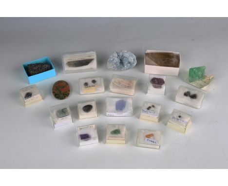 A selection of small and mainly polished mineral specimens, including rutilated quartz, natural citrine, tigers eye and blue 