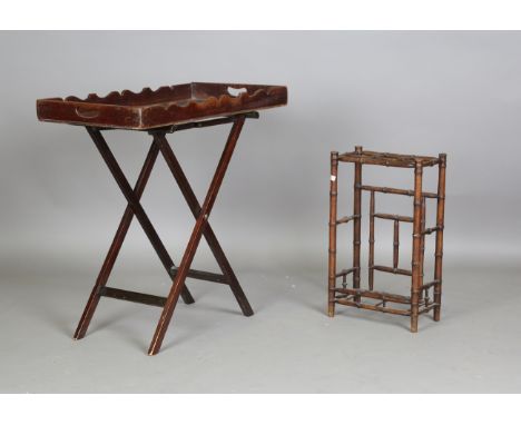 A 19th century mahogany butler's tray with pierced handles, width 81cm, together with a later stand and a bamboo stick stand,