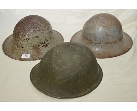Late pattern British steel helmet and 2 French style steel helmets (3)