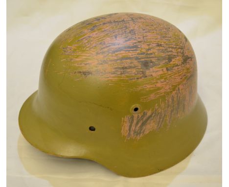 German M40 steel helmet with desert painted colourings with original leather sweatband and liner stamped 'ET66 4737' 