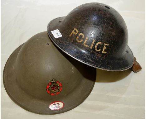 WWII period British police steel helmet with liner and chin strap and similar NFS helmet marked No.32 (2)