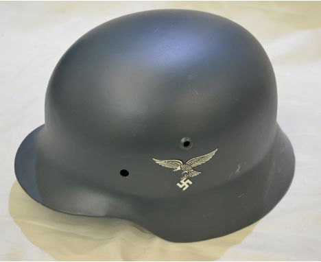 German M40 steel helmet (repainted with replacement decal) stamped '3592 ET68'