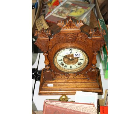 A LATE 19TH CENTURY WALNUT CASE ANSONIA MANTEL CLOCK, the cream chapter ring with Roman numerals, height approximately 38cm (