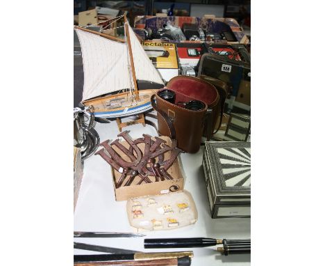 AN EASEL MIRROR, a pair of cased Skybolt binoculars, model boat, novelty miniature wooden animals and various novelty horse s