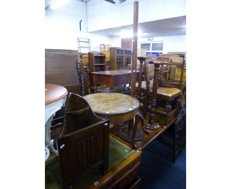 A CIRCULAR WALNUT OCCASIONAL TABLE, a corner oak umbrella stand, an oak standard lamp (no fittings), a mahogany plant stand a