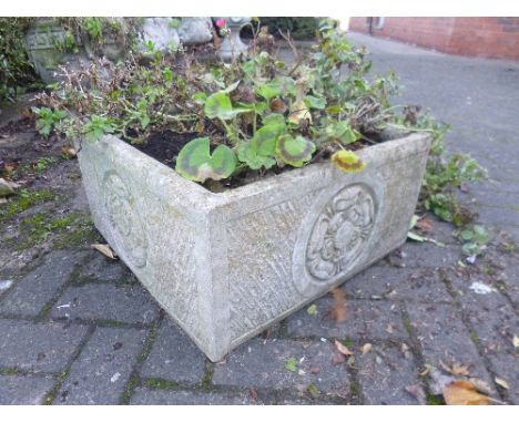 A SQUARE COMPOSITE GARDEN PLANTER