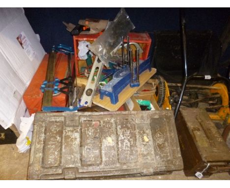 TWO METAL TOOL BOXES AND LOOSE, containing a quantity of miscellaneous including hand tools, Mitre saw, etc