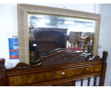A MODERN BEVELLED WALL MIRROR, approximate size width 112cm x height 81cm