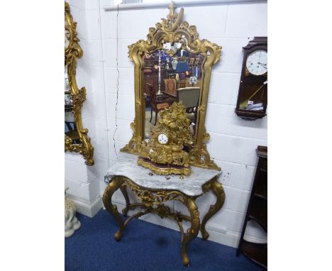 A MODERN CONSOLE TABLE, with carved and gilded base and white veined marble top, together with a similar gilt framed wall mir