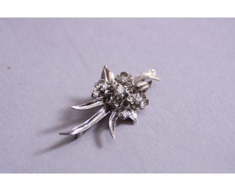 A MODERN DIAMOND SPRAY BROOCH, floral and foliate design, measuring approximately 55 x 24mm, pin and roller catch fitting, pr