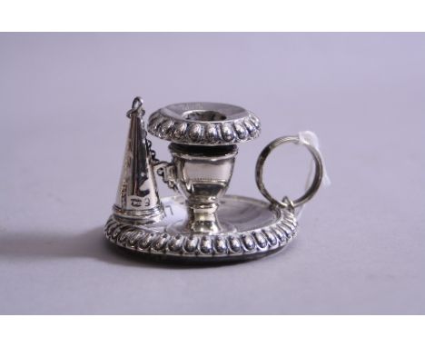 A SILVER CHAMBER STICK WITH BEADED RIMS, snuffer on hook and chain, monogrammed 'JMC' marks, rubbed, approximately 5.5cm high