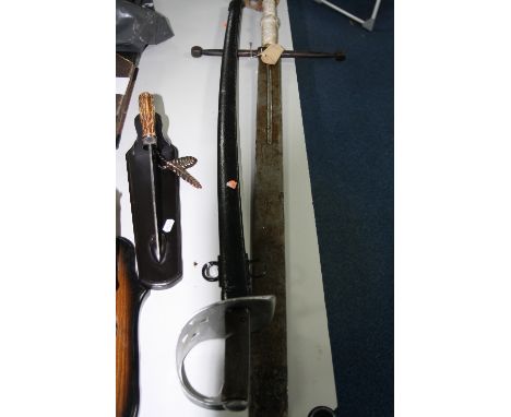 A REPRODUCTION SWORD AND SCABBARD, together with a reproduction excution sword (2)