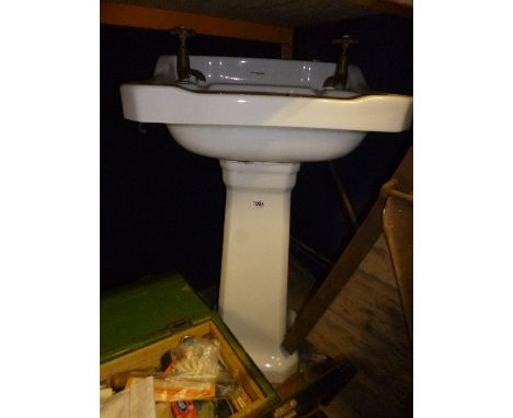 A CERAMIC WASH BASIN AND PEDESTAL, Armitage Ware name printed