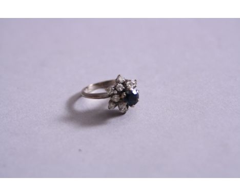 AN 18CT WHITE GOLD DIAMOND AND SAPPHIRE STEP RING, ring size N1/2