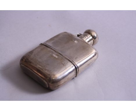 A SILVER HIP FLASK, of plain form having screw hinged lid, Sheffield 1902, approximately 12cm, 5ozt