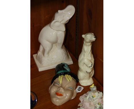 A HUNGARIAN FACE MASK, a Polar Bear decanter and a ceramic elephant (3)