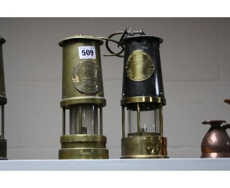 A BRASS ECCLES MINERS LAMP, 'GR65' and another Type SL Ministry Power Saftey lamp (2)