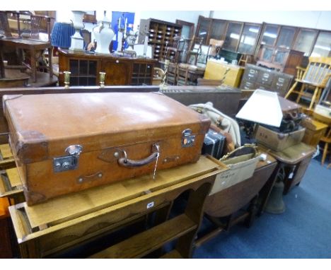 A LARGE LEATHER SUITCASE, various other bags, table lamp, etc