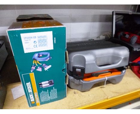 A BOXED BLACK AND DECKER QUATTRO THREE IN ONE ELECTRIC MULTI TOOL