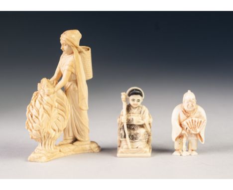 THREE EARLY TWENTIETH CENTURY CARVED IVORY FIGURES, comprising: NETSUKE OF AN OLD MAN, with walking cane and open fan, OKIMIN