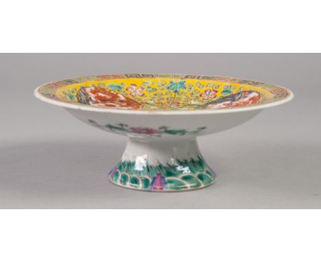 A CHINESE LATE QING DYNASTY PORCELAIN PEDESTAL SAUCER DISH polychrome enamelled with flowers, gourds and foliate scrollwork o