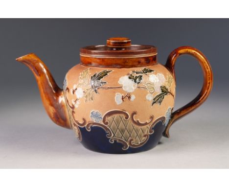 ROYAL DOULTON 'SLATER'S PATENT MOULDED POTTERY TEAPOT AND COVER, of typical form decorated in tones of green, brown, pink and