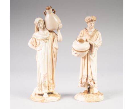 A PAIR OF LATE VICTORIAN ROYAL WORCESTER PORCELAIN MOORISH FIGURES AS WATER CARRIERS, the blushed ivory glaze picked out in p