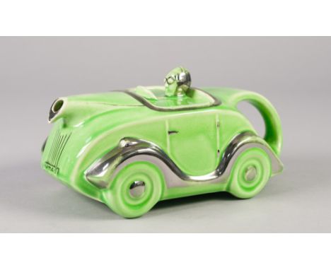 SADLERS STYLE GREEN GLAZED RACING CAR PATTERN POTTERY TEAPOT, heightened in platinum lustre, 'MADE IN ENGLAND' and Reg No, im