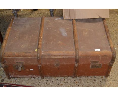 A vintage wooden bound travelling trunk