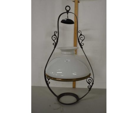 A brass mounted table lamp with white shade