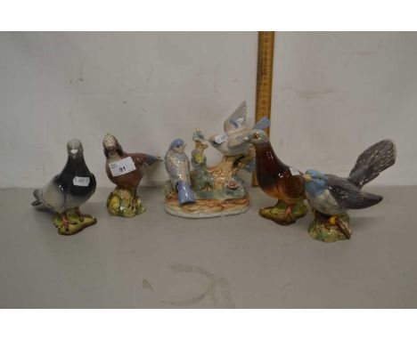 Quantity of ceramic bird models mainly by Beswick including pigeons and others