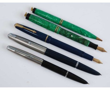 A cased Parker Duofold fountain pen and propelling pencil set, in marbled jade green with gold trim, Made in Canada, the nib 