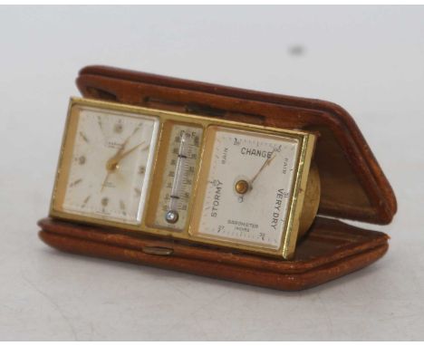 A vintage Looping 8-day travel clock, thermometer and barometer, 13cmThermometer does not seem to be working.