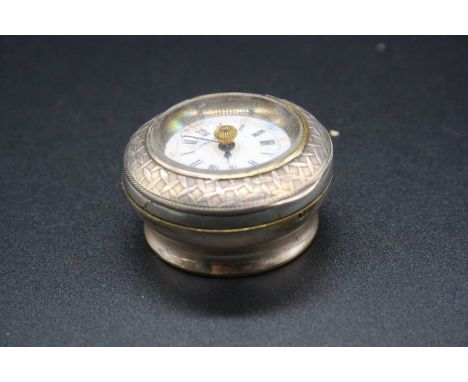 A Brevete watch as made for a walking cane terminal, in white metal case with hinged cover, having signed white enamel and je