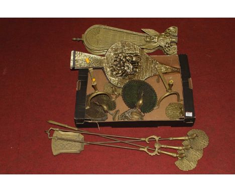 A collection of vintage brassware, to include horse brasses and a peacock fire screen 