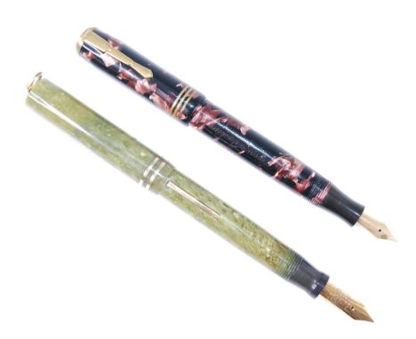 A Hoover de Luxe fountain pen in marbled rose and black, double jewelled and with gold colour trim and triple banded cap, the