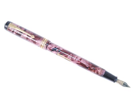 A circa 1950s boxed Conway Stewart 388 fountain pen, in marbled rose pearl and with 14ct gold nib, made in England, 12.5cm (c