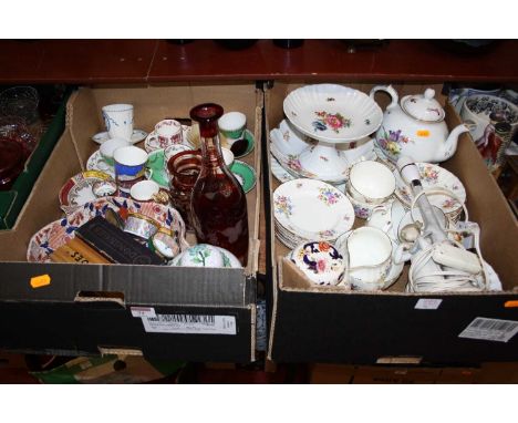 Two boxes of ceramics and glassware, to include a cranberry overlaid glass decanter and enamel patch boxes 