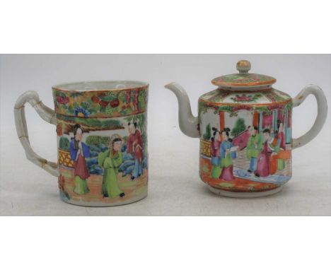 A 19th century Chinese Canton porcelain tankard, enamel decorated with an interior scene, h.10cm; together with a Chinese Can