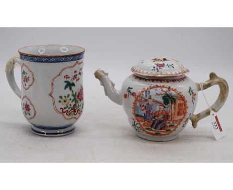 An 18th century Chinese porcelain tankard, enamel decorated with flowers, h.14cm; together with a 19th century Samson porcela