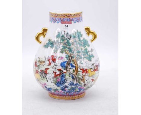 A Chinese porcelain vase, of Hu form, enamel decorated in the hundred Deers pattern, h.23cm