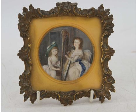 A 19th century double portrait miniature, depicting two children, one playing a harp, housed within a floral gilt metal frame