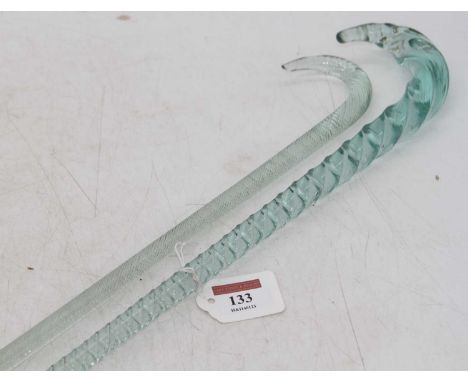 A clear spiral glass walking stick, 97cm; together with another similar