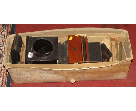 A vintage plate camera, boxed